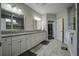 Double vanity bathroom with granite countertop and walk in shower at 119 Camelia Park Ln, Summerville, SC 29486