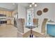 Casual dining area with glass table and wicker chairs near kitchen at 7798 Park Gate Dr, North Charleston, SC 29418