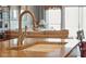 Modern kitchen sink and faucet with granite countertop at 108 W 2Nd St, Folly Beach, SC 29439