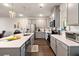 Modern kitchen with grey cabinets, quartz countertops, and an island at 139 Winding River Dr, Johns Island, SC 29455