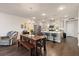 Open concept kitchen with island, stainless steel appliances, and wood flooring at 139 Winding River Dr, Johns Island, SC 29455