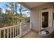 Private balcony overlooking a tranquil wooded area at 139 Winding River Dr, Johns Island, SC 29455
