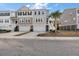 Three story townhome with attached garage and front yard at 139 Winding River Dr, Johns Island, SC 29455