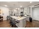 Modern kitchen with grey cabinets, quartz countertops, and an island at 139 Winding River Dr, Johns Island, SC 29455