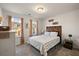 Cozy bedroom featuring a rustic wood headboard and large windows at 139 Winding River Dr, Johns Island, SC 29455