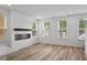 Living room with fireplace and hardwood floors at 1832 Helm Ave, North Charleston, SC 29405