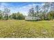 Single-wide mobile home with a large grassy yard at 122 Rambo Dr, Summerville, SC 29483