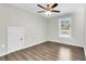 Bedroom with ceiling fan, wood-look floors, and window at 2711 Henry St, North Charleston, SC 29405