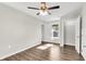 Bedroom with ceiling fan, window, and walk-in closet at 2711 Henry St, North Charleston, SC 29405