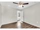 Spacious bedroom with ceiling fan, wood-look flooring and large window at 2711 Henry St, North Charleston, SC 29405