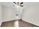 Spacious bedroom with ceiling fan, window, and wood-look floors at 2711 Henry St, North Charleston, SC 29405