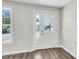 Bright entryway with hardwood floors and a white door at 2711 Henry St, North Charleston, SC 29405