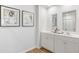 Double vanity bathroom with modern finishes at 728 Long Bluff Rd, Summerville, SC 29486