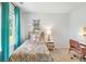 Bohemian-style bedroom with twin bed, colorful bedding, and workspace at 728 Long Bluff Rd, Summerville, SC 29486