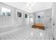 Light-filled entryway with white tile floors and access to adjacent rooms at 112 Minus St, Saint George, SC 29477