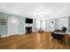 Spacious living room with hardwood floors and fireplace at 112 Minus St, Saint George, SC 29477