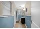 Clean bathroom with tiled floor, vanity, and shower/tub combo at 112 Minus St, Saint George, SC 29477