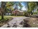 Brick house with detached garage and large yard at 112 Minus St, Saint George, SC 29477