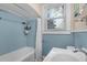 Light and bright bathroom with a shower/tub and window at 112 Minus St, Saint George, SC 29477