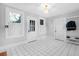 Spacious entryway with white tile floors, white walls, and plenty of natural light at 112 Minus St, Saint George, SC 29477