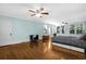 Large bedroom with hardwood floors, ceiling fan and lots of natural light at 112 Minus St, Saint George, SC 29477