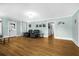 Hardwood floor living room, fireplace and access to other rooms at 112 Minus St, Saint George, SC 29477