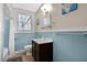 Updated bathroom features a tiled shower/tub combo, vanity, and modern fixtures at 112 Minus St, Saint George, SC 29477