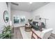 Bright living room with a gray couch and natural light at 104 Aplomb Aly # 16, Charleston, SC 29414