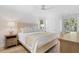 Bright bedroom featuring a king-size bed and plenty of natural light at 1323 Pelican Watch Villas, Seabrook Island, SC 29455