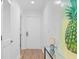 Light and airy entryway with a console table and large artwork at 1323 Pelican Watch Villas, Seabrook Island, SC 29455
