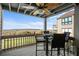 Deck with table, chairs, and stunning water view at 1323 Pelican Watch Villas, Seabrook Island, SC 29455