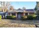 Brick ranch house with mature landscaping at 150 M L King Blvd, Saint Stephen, SC 29479