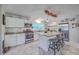 Bright kitchen with stainless steel appliances and granite countertops at 1839 Manigault Pl, Charleston, SC 29407