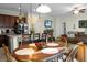 Open concept kitchen and living room with island and breakfast bar at 476 Rockville Rd, Moncks Corner, SC 29461
