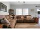 Spacious living room with large sectional sofa and neutral decor at 476 Rockville Rd, Moncks Corner, SC 29461