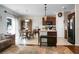 Open concept kitchen with island, stainless steel appliances, and breakfast area at 476 Rockville Rd, Moncks Corner, SC 29461