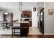 Eat-in kitchen with island, dark wood cabinets, and breakfast bar at 476 Rockville Rd, Moncks Corner, SC 29461