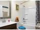 Clean bathroom with tub shower combination and updated vanity at 476 Rockville Rd, Moncks Corner, SC 29461