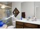 Bathroom with shower, vanity, and decorative accents at 476 Rockville Rd, Moncks Corner, SC 29461