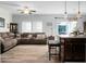 Spacious living room with sectional sofa and large windows at 476 Rockville Rd, Moncks Corner, SC 29461