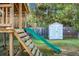 Playset and storage shed in a fenced backyard at 476 Rockville Rd, Moncks Corner, SC 29461
