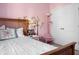 Charming bedroom with double doors and whimsical wall art at 476 Rockville Rd, Moncks Corner, SC 29461