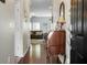 Well-lit entryway leading to living room with hardwood floors at 476 Rockville Rd, Moncks Corner, SC 29461