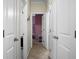 Bright hallway with neutral walls and carpet flooring at 476 Rockville Rd, Moncks Corner, SC 29461