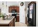 Modern kitchen with stainless steel appliances and an island at 476 Rockville Rd, Moncks Corner, SC 29461