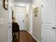 Inviting entryway with hardwood floors and a classic secretary at 476 Rockville Rd, Moncks Corner, SC 29461