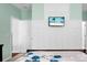Serene bedroom with wall-mounted TV and soft bedding at 476 Rockville Rd, Moncks Corner, SC 29461