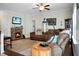 Living room with sectional sofa, fireplace, and hardwood floors at 476 Rockville Rd, Moncks Corner, SC 29461