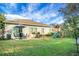 Large backyard with patio, grill, playset, and shed at 476 Rockville Rd, Moncks Corner, SC 29461