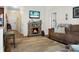 Living room featuring a stone fireplace and comfortable seating at 476 Rockville Rd, Moncks Corner, SC 29461